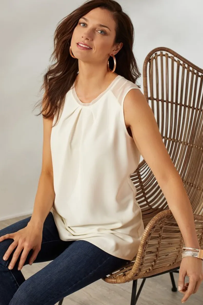 Túnica Teagan de Soft Surroundings - Blusa Holgada con Detalles en Punto para un Estilo Casual Sofisticado  

(Nota: Esta versión reorganiza elementos clave manteniendo la esencia original, incorpora términos descriptivos naturales como 