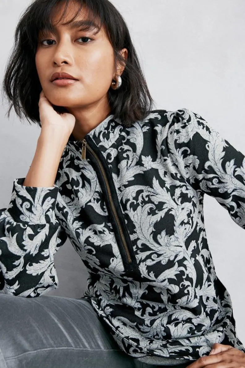 Sudadera Winona de Entornos Suaves - Prenda Superior en Tono Neutro con Diseño Fluidizado